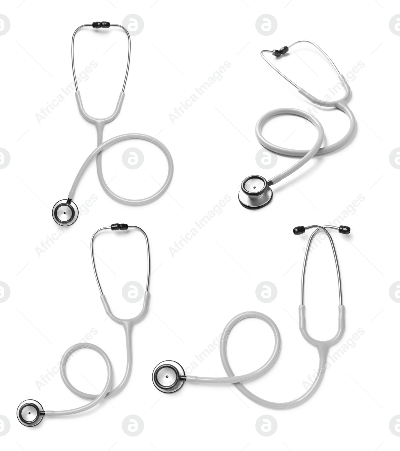 Image of Set with stethoscopes on white background 