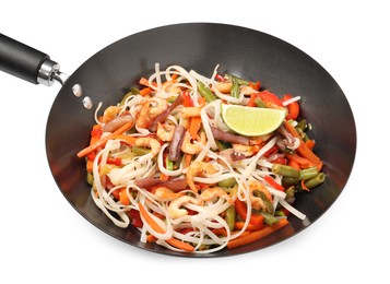 Photo of Shrimp stir fry with noodles and vegetables in wok isolated on white