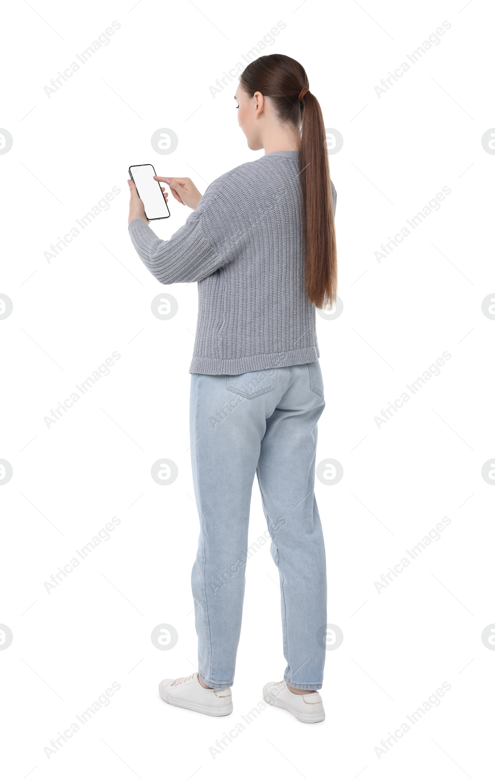 Photo of Woman using smartphone with blank screen on white background