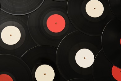 Vintage vinyl records as background, top view
