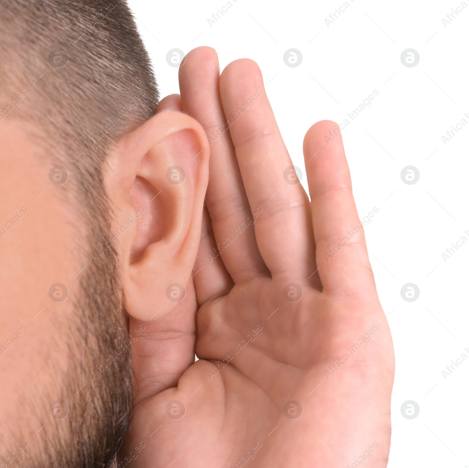 Photo of Young man with hearing problem on white background, closeup