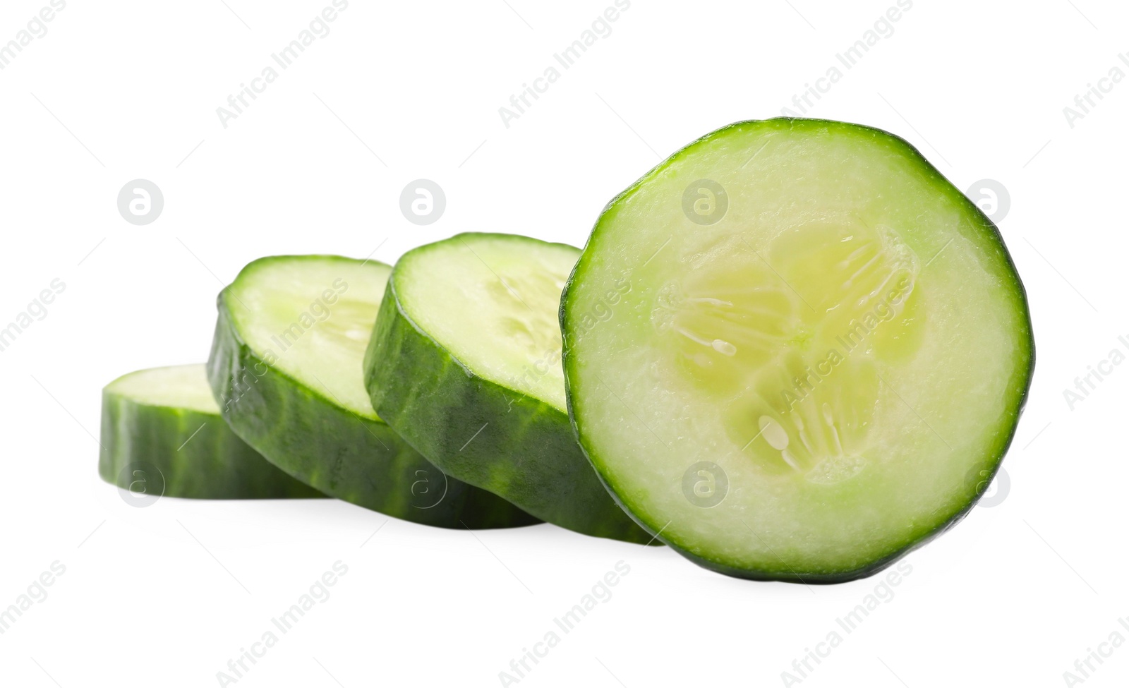 Photo of Slices of long cucumber isolated on white