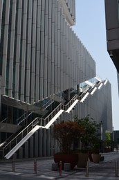 Photo of City street with beautiful modern urban architecture