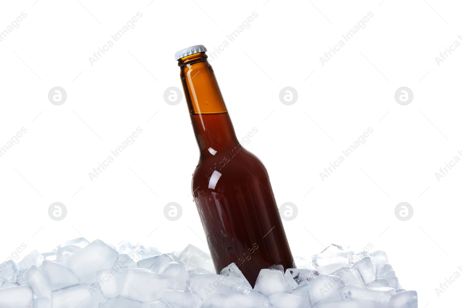 Photo of Bottle of beer on ice cubes against white background