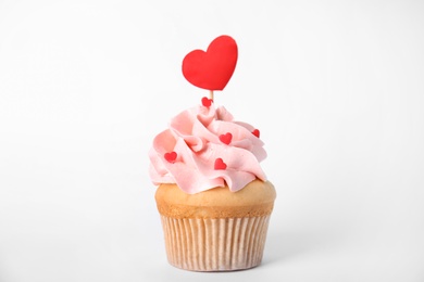Photo of Tasty cupcake for Valentine's Day on white background