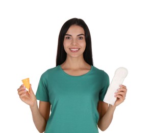 Photo of Young woman with menstrual cup and pad on white background