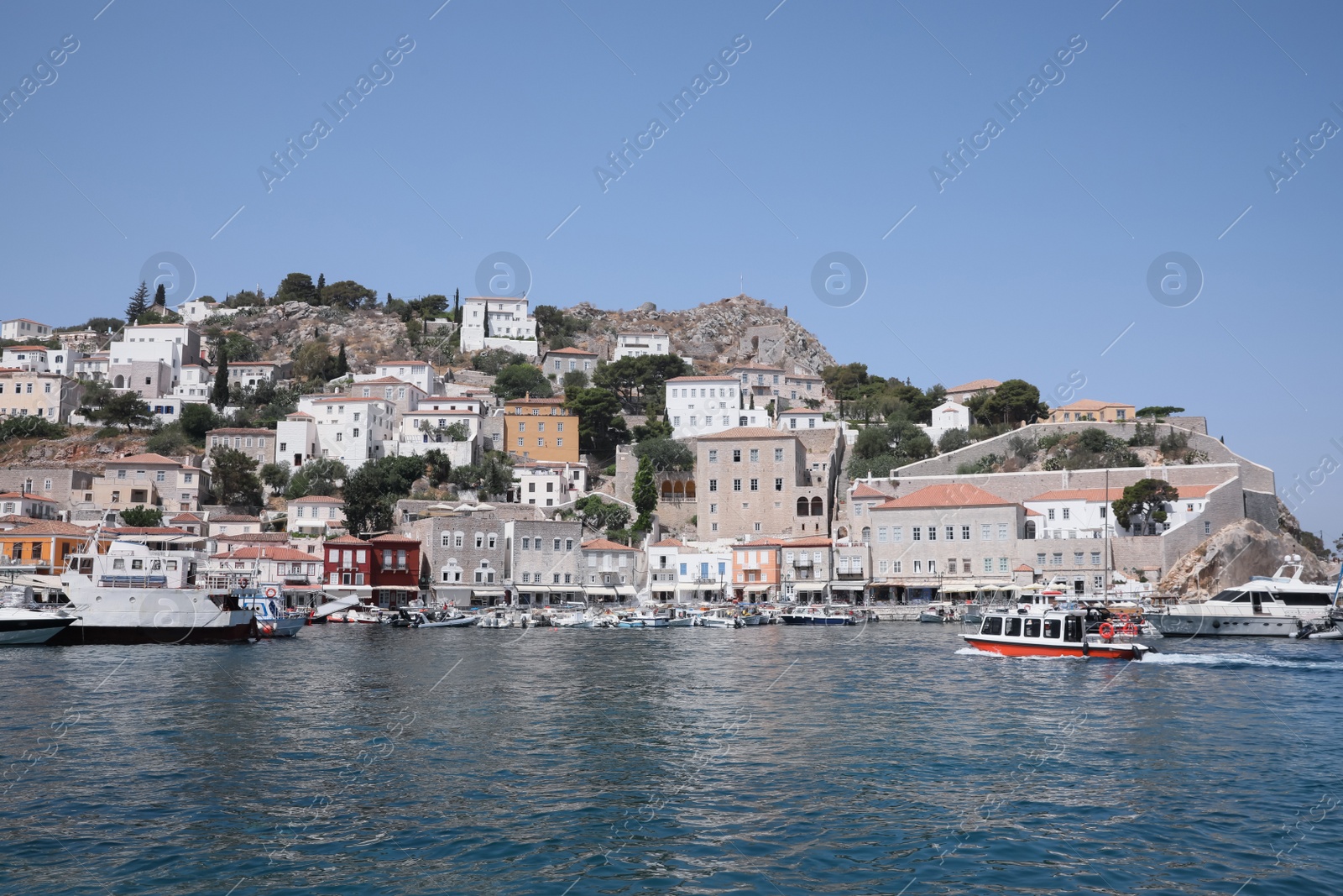 Photo of Beautiful view of sea with boats and coastal city