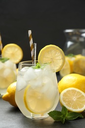 Natural lemonade with mint on grey table. Summer refreshing drink