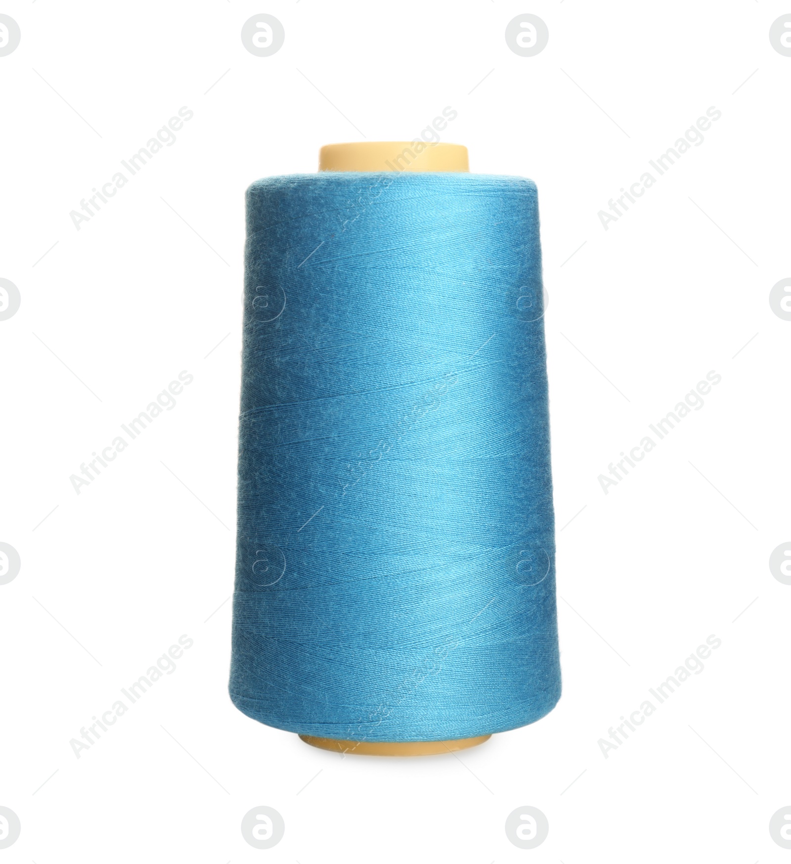 Photo of Spool of light blue sewing thread isolated on white