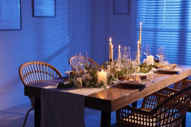 Festive table setting with beautiful tableware and decor indoors