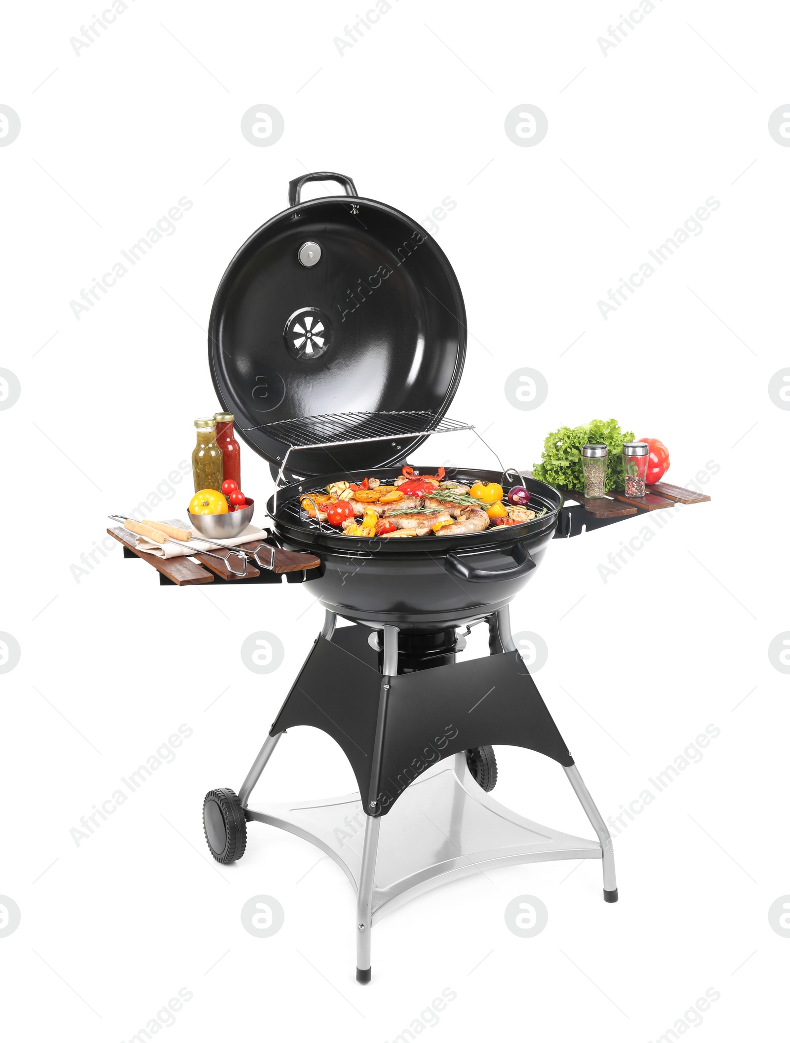 Photo of Modern barbecue grill with tasty food on white background