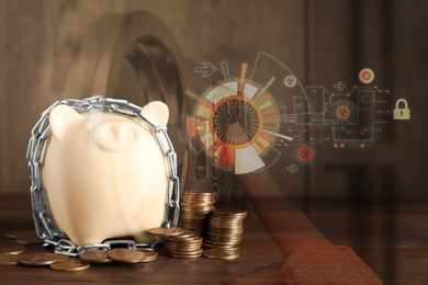 Piggy bank with steel chain, coins and woman opening steel safe, closeup 