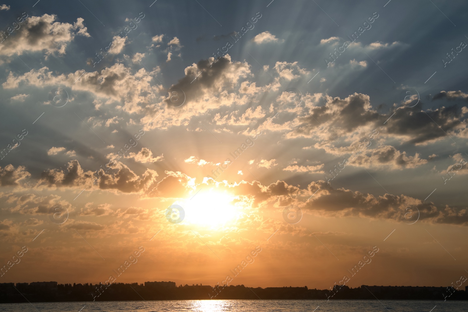 Photo of Picturesque view of beautiful sunrise on riverside. Morning sky