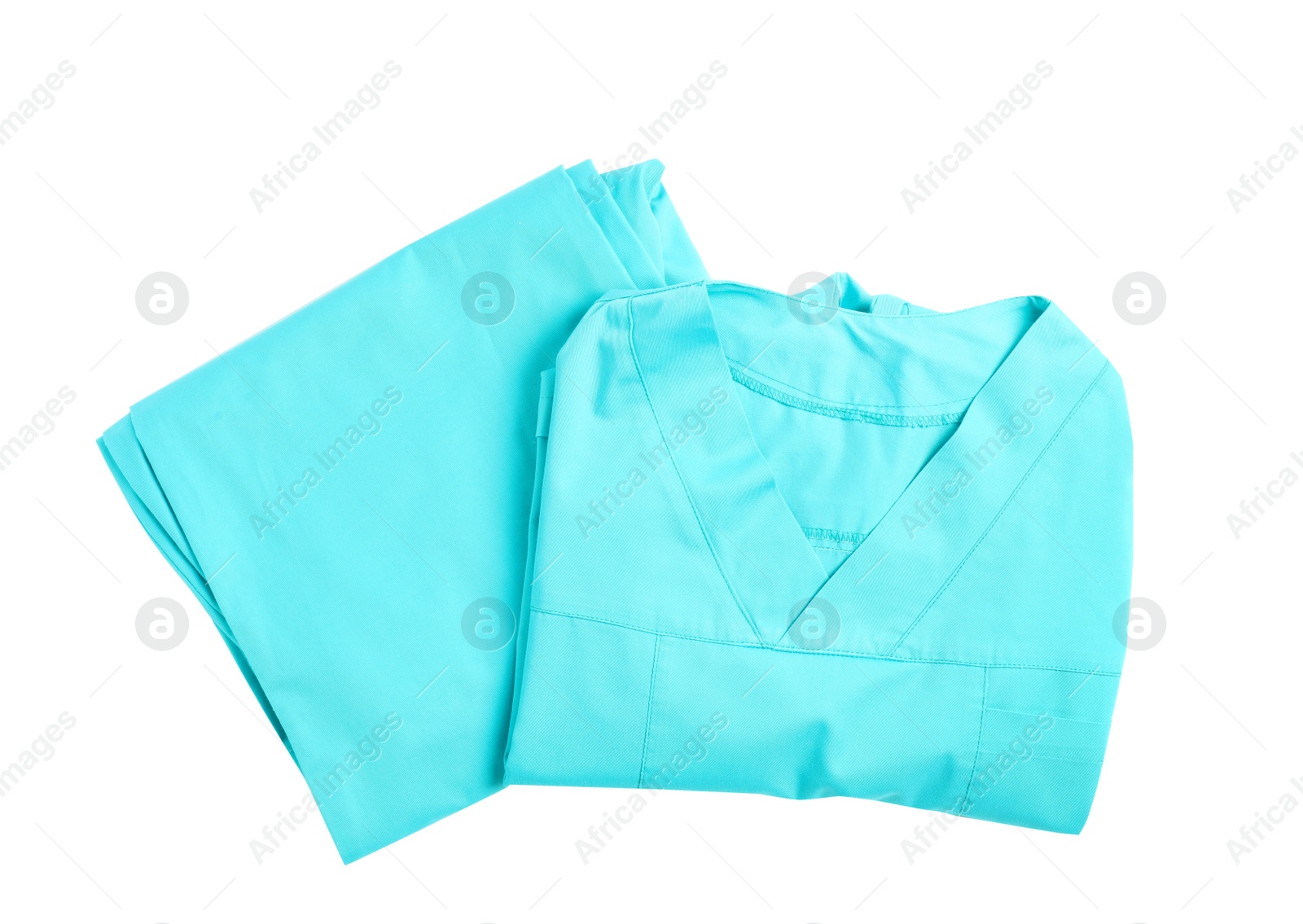 Photo of Medical uniform on white background, top view. Professional work clothes