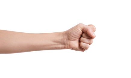 Woman showing fist on white background, closeup of hand