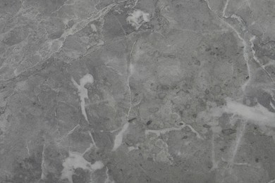 Photo of Texture of grey marble surface as background, closeup