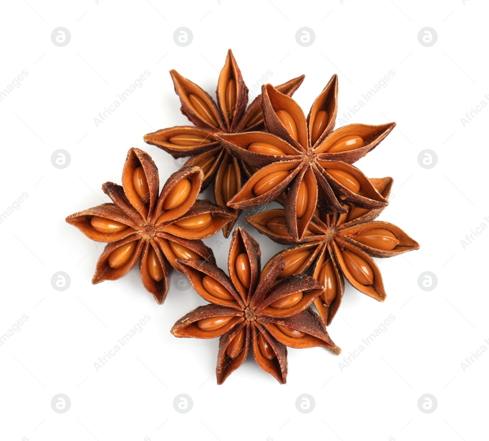 Photo of Dry anise stars with seeds on white background, top view