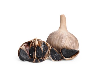 Photo of Organic fermented black garlic isolated on white