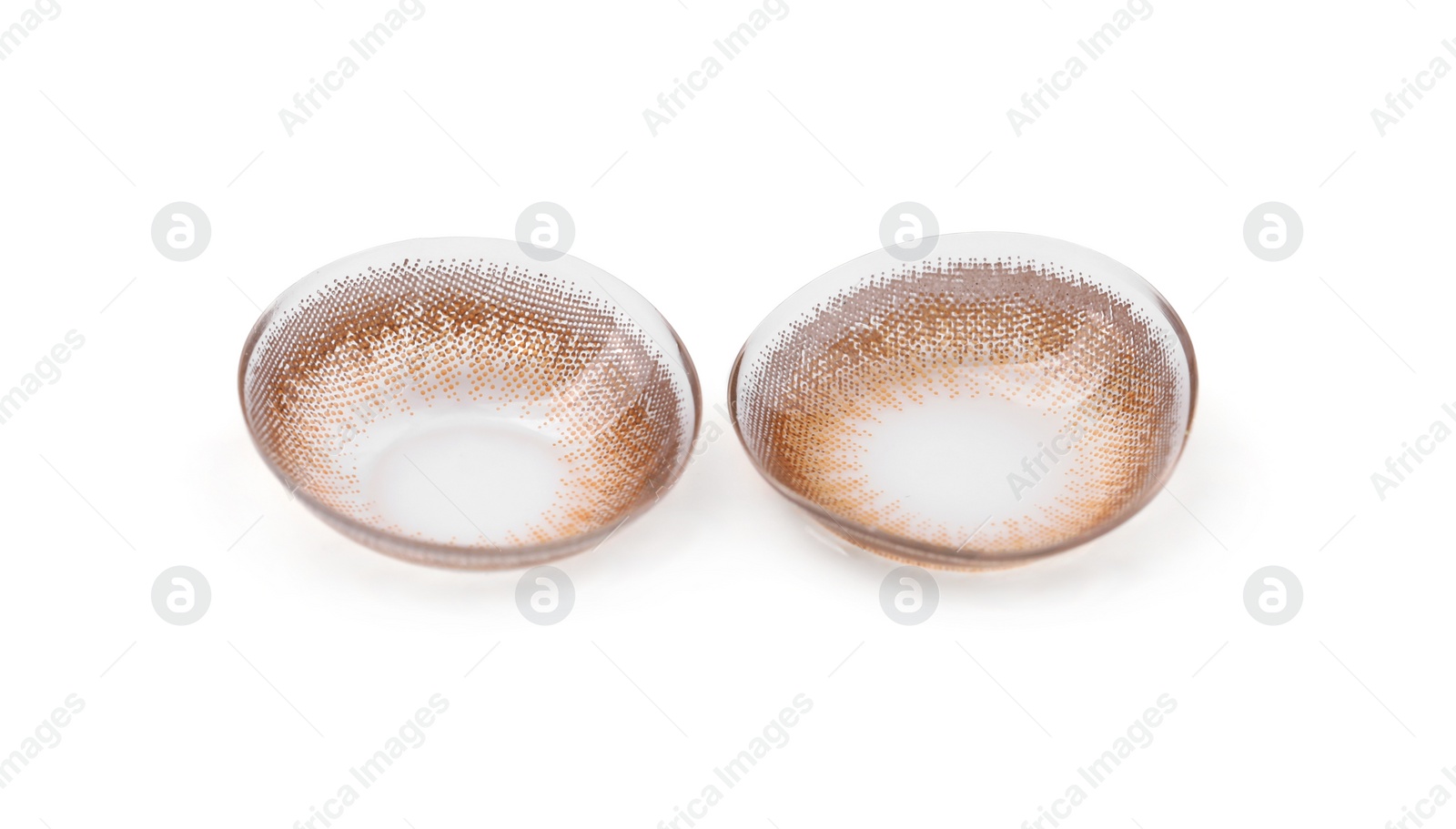 Photo of Two color contact lenses isolated on white