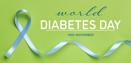 Image of World Diabetes Day. Light blue ribbon on green background, top view. Banner design