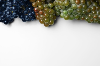 Fresh ripe juicy grapes on white background, top view