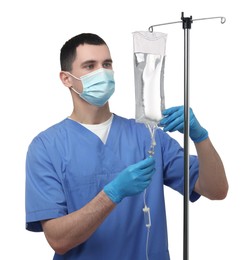 Photo of Nurse setting up IV drip on white background