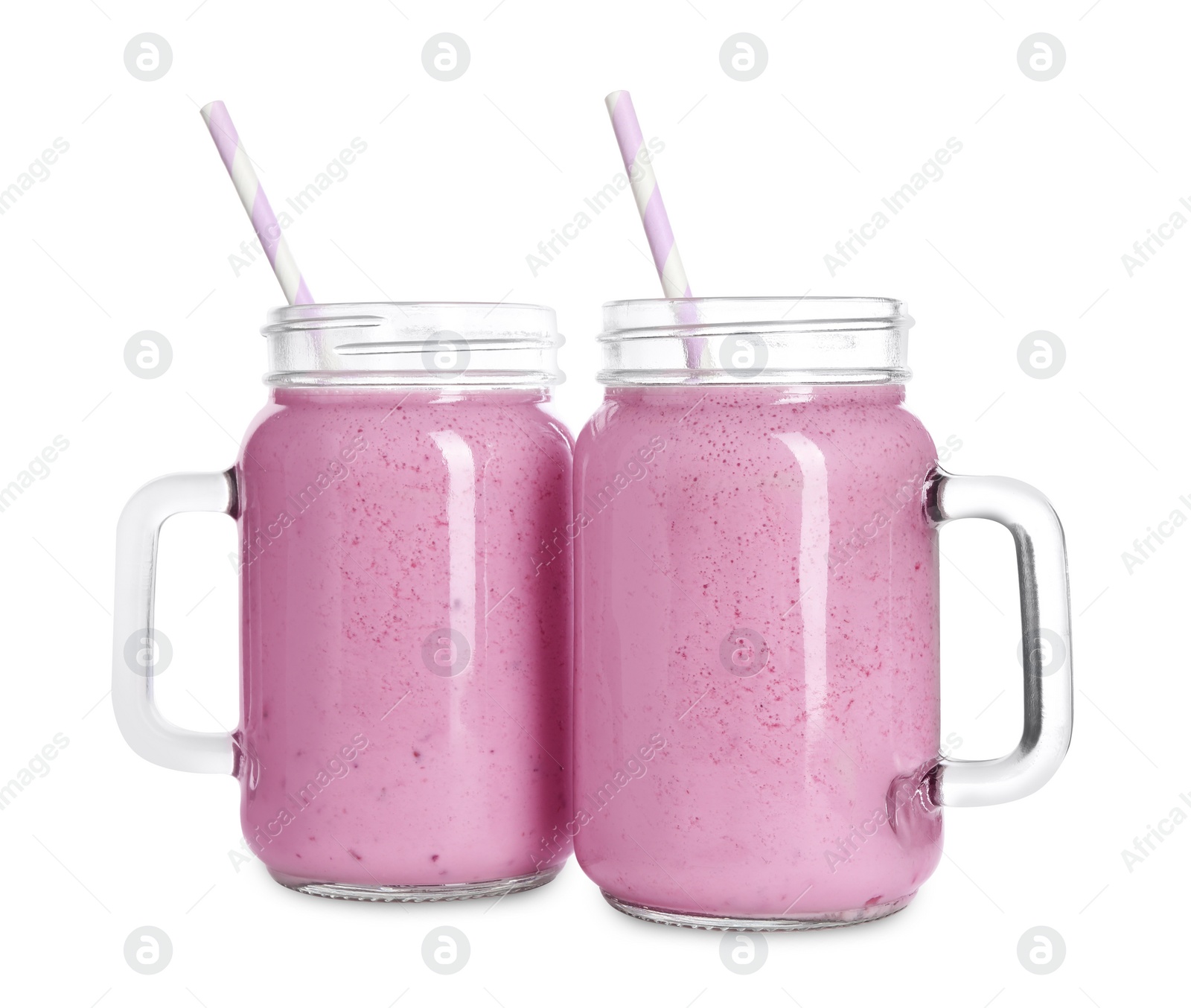 Photo of Delicious blackberry smoothie with straws in mason jars on white background