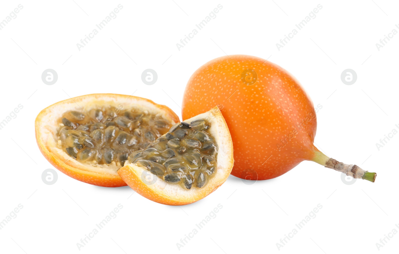 Photo of Whole and cut delicious ripe granadillas on white background