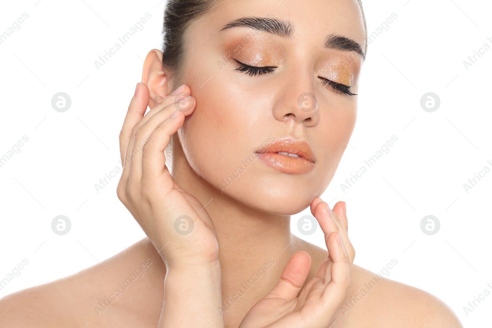 Photo of Beautiful young woman with glitter makeup on white background