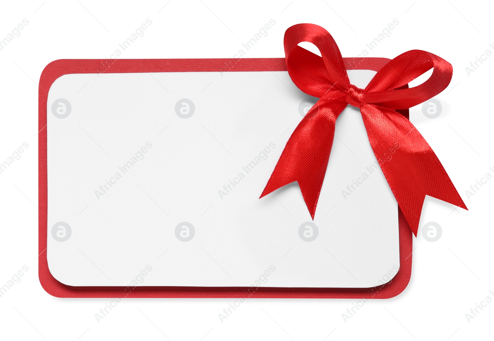 Photo of Blank gift card with red bow isolated on white, top view