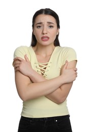 Photo of Young woman suffering from fever on white background. Cold symptoms