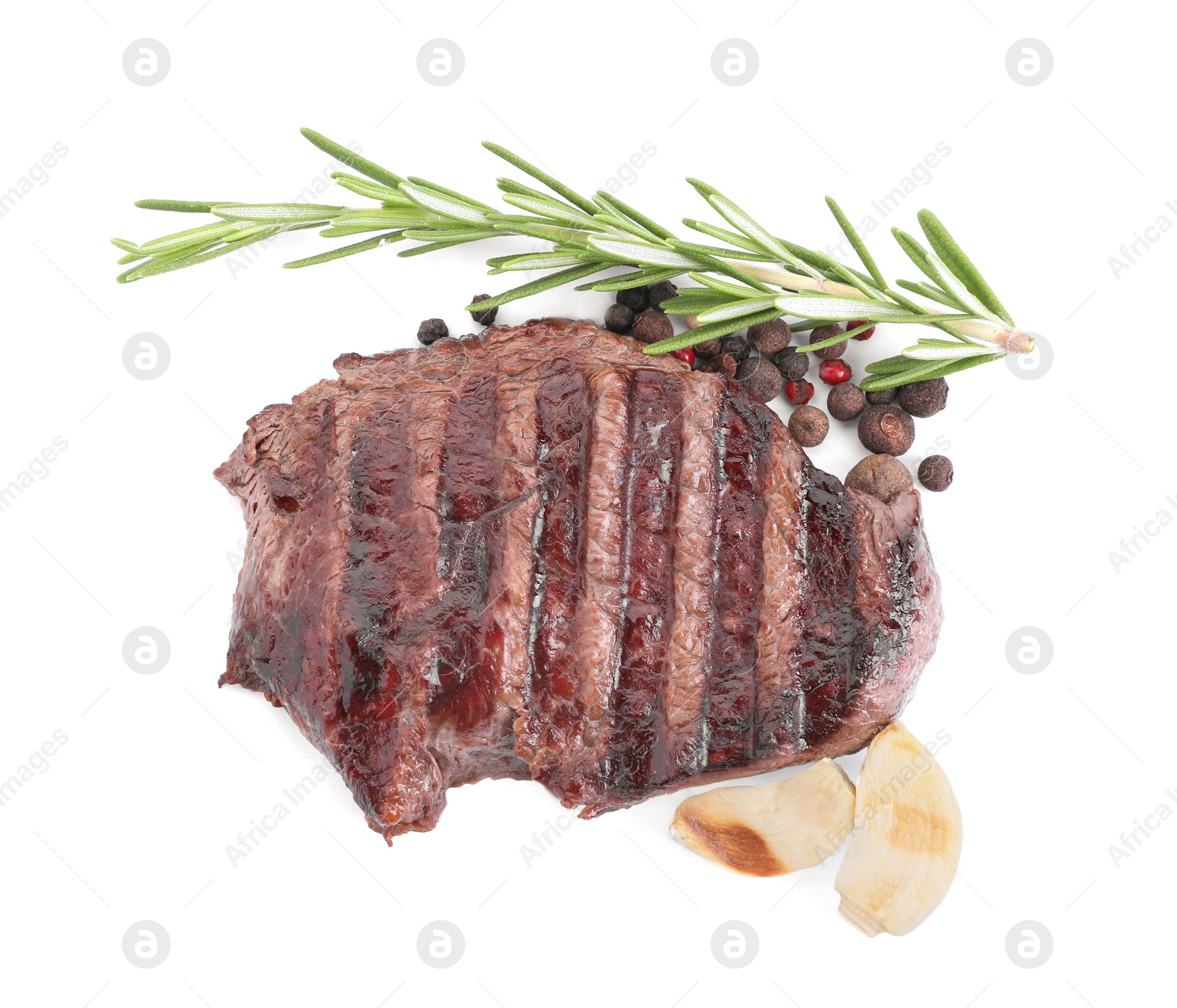 Photo of Piece of delicious grilled beef meat, rosemary and spices on white background, top view