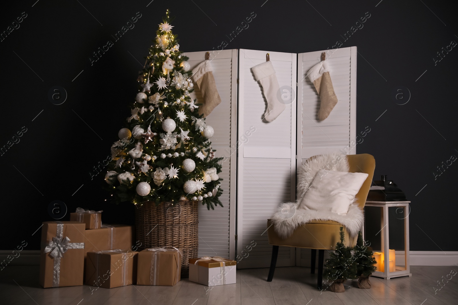 Photo of Beautiful Christmas themed photo zone. Cozy living room interior imitation