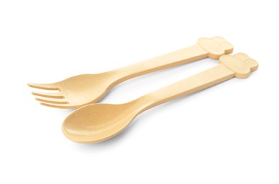 Photo of Plastic cutlery on white background. Serving baby food