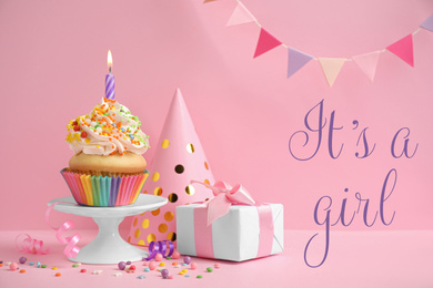 Image of Composition with baby shower cupcake for girl on pink background
