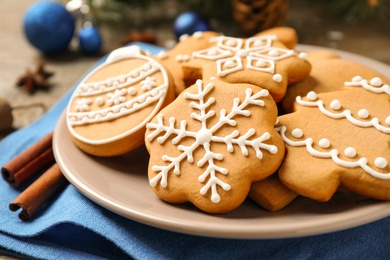 Photo of Tasty homemade Christmas cookies on table, closeup view