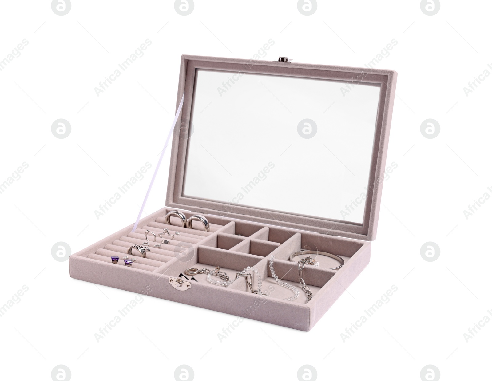 Photo of Jewelry box with many different silver accessories isolated on white