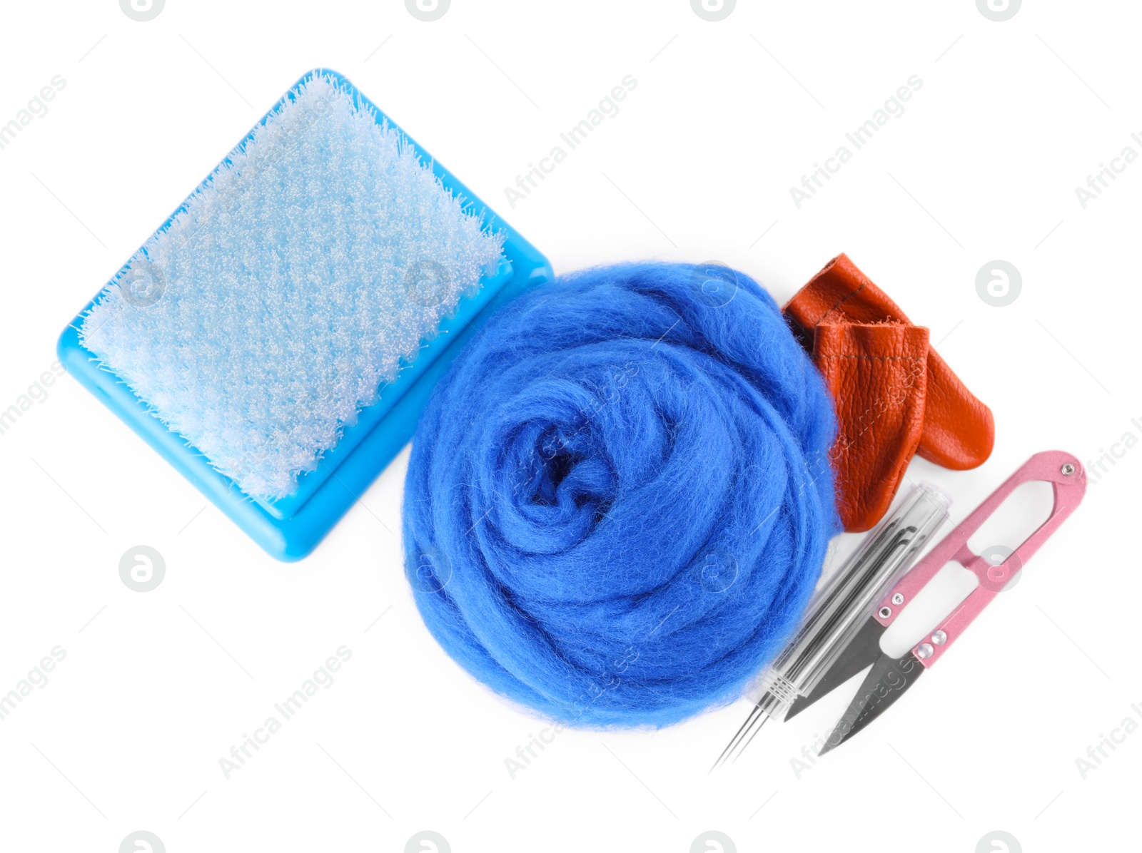 Photo of Blue wool and needle felting tools isolated on white, top view