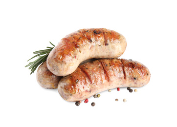 Grilled sausages and rosemary isolated on white