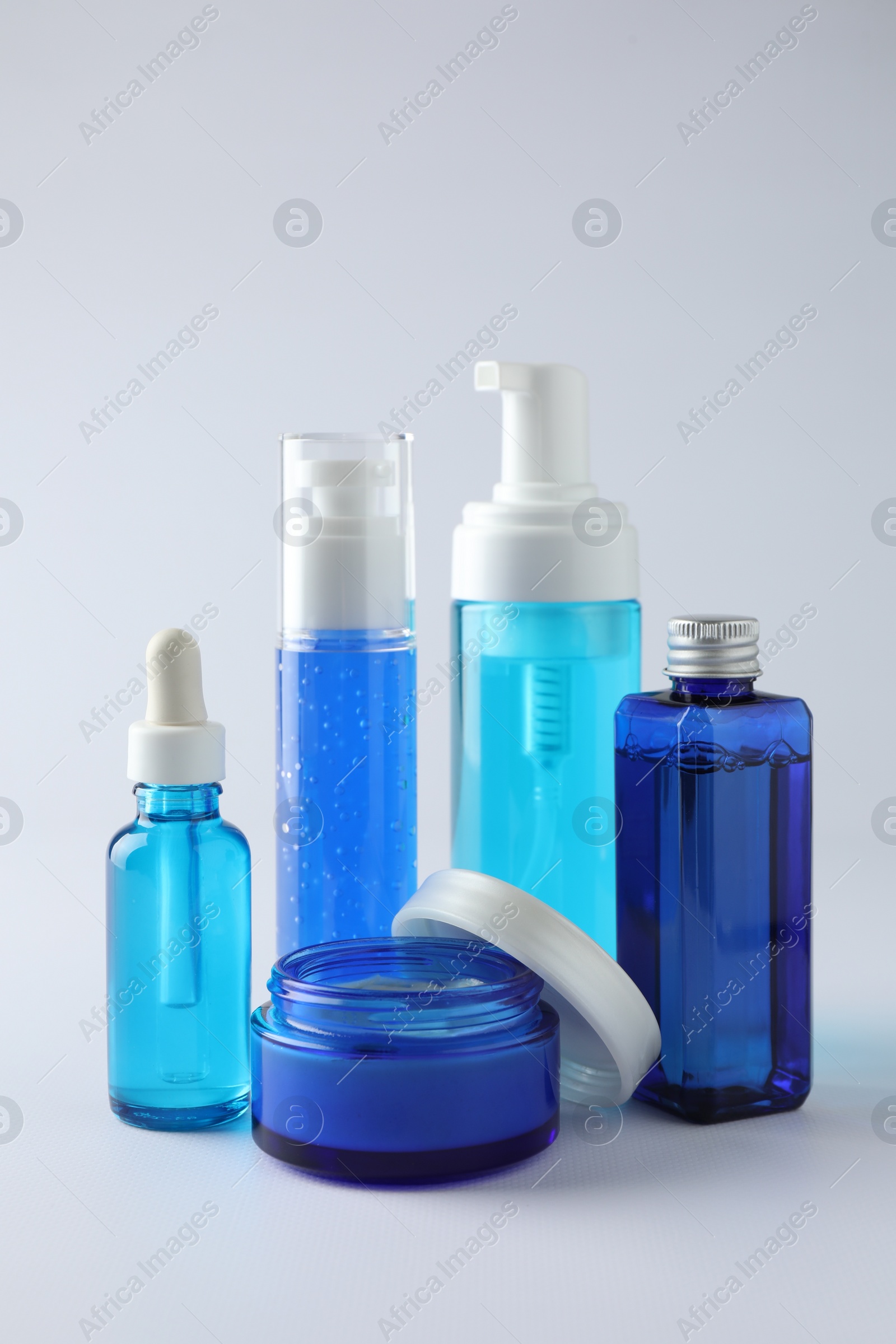 Photo of Set of luxury cosmetic products on white background