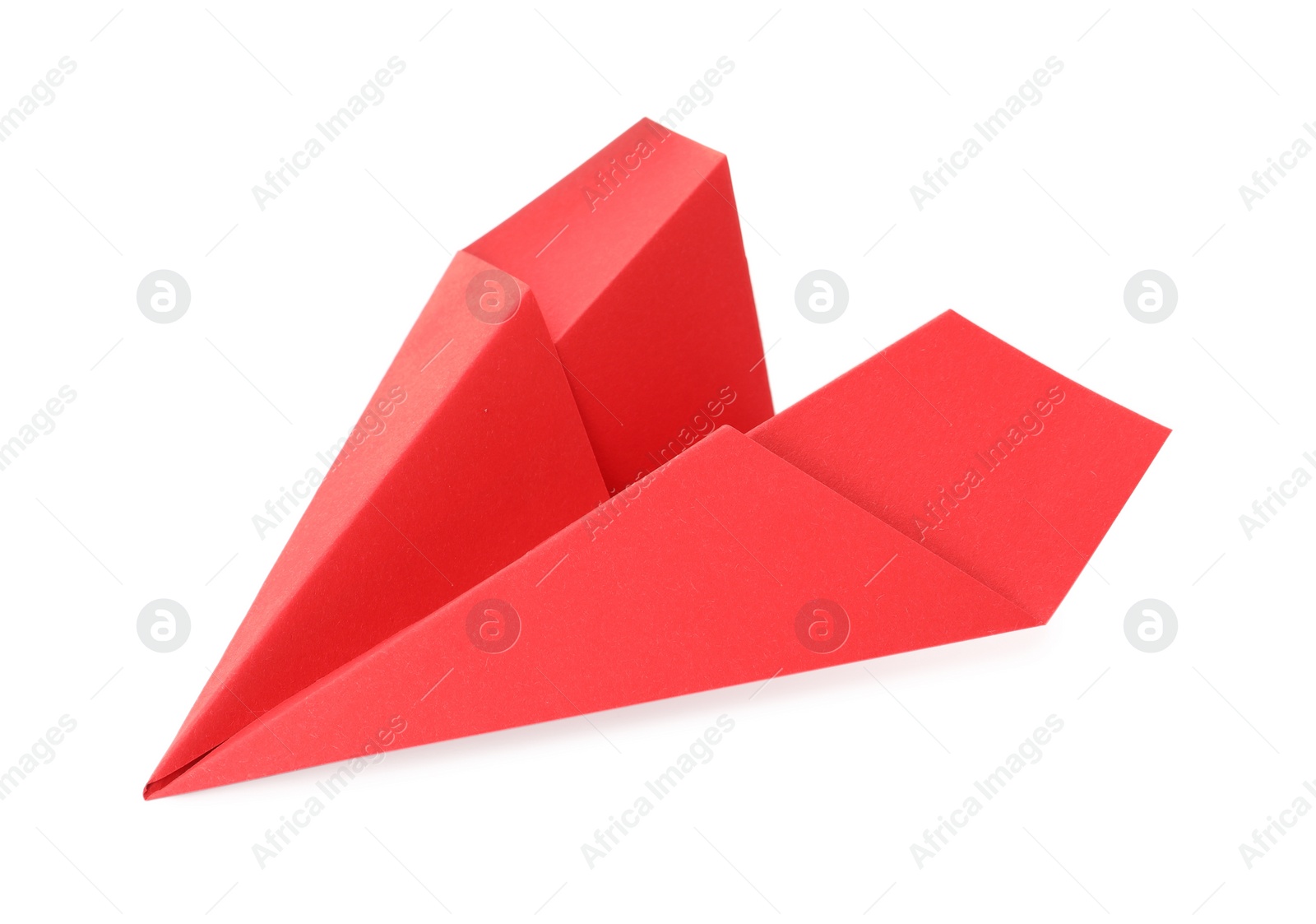 Photo of Handmade red paper plane isolated on white