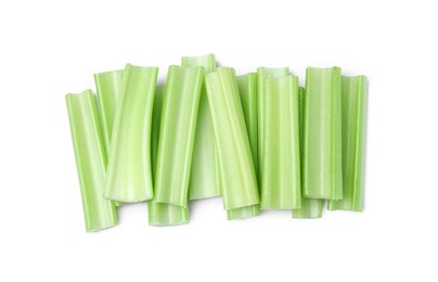 Photo of Fresh cut celery stalks isolated on white, top view