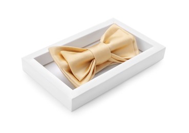 Photo of Stylish beige bow tie in box on white background