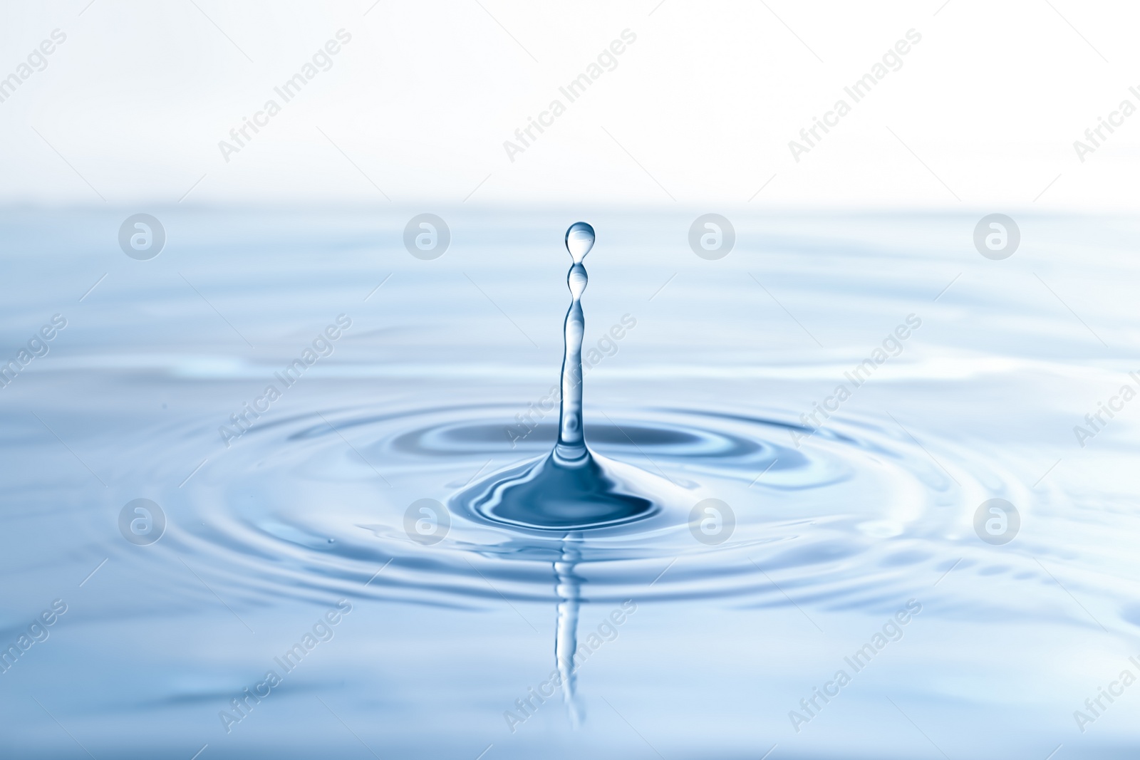 Photo of Splash of clear water with drops as background, closeup