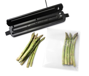 Photo of Sealer for vacuum packing and plastic bag of asparagus on white background, top view