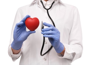 Photo of Doctor with stethoscope and red heart on white background, closeup. Cardiology concept