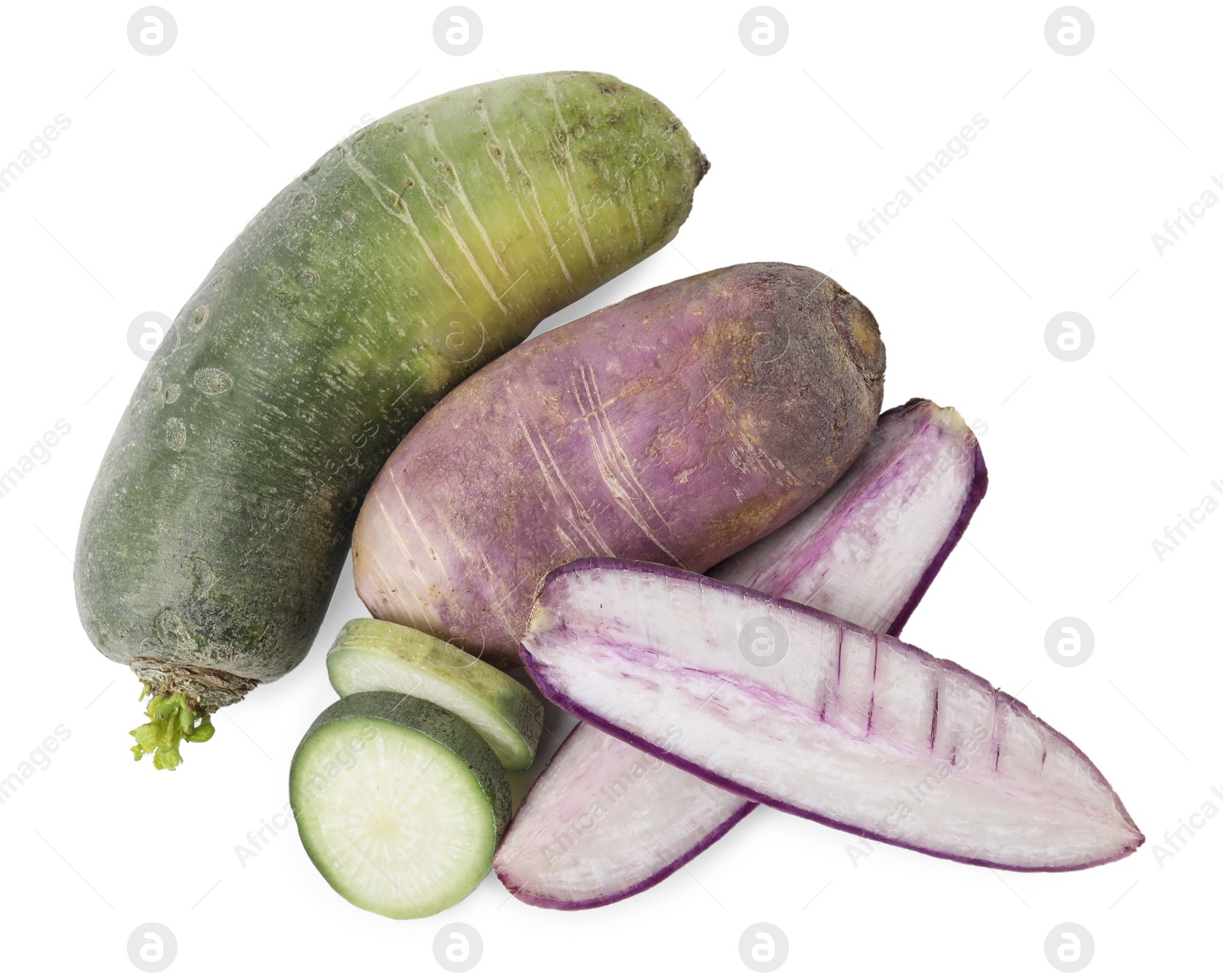 Photo of Purple and green daikon radishes isolated on white, top view