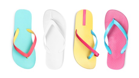 Set with different colorful flip flops on white background, top view 