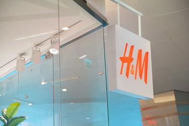 Photo of Warshaw, Poland - May 14, 2022: H&M store in shopping mall