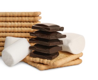 Photo of Delicious crackers, marshmallow and chocolate pieces isolated on white. Cooking sweet sandwiches